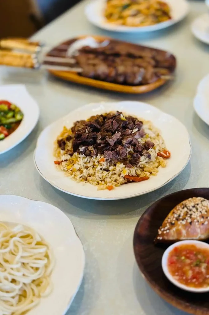 Featured Xinjiang Plav hand pilaf with lamb and carrots at Intizar Dubai