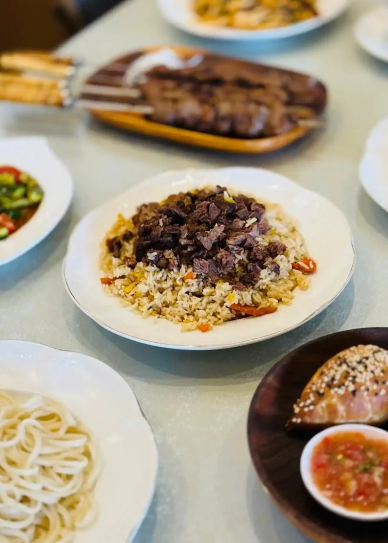 Featured Xinjiang Plav hand pilaf with lamb and carrots at Intizar Dubai